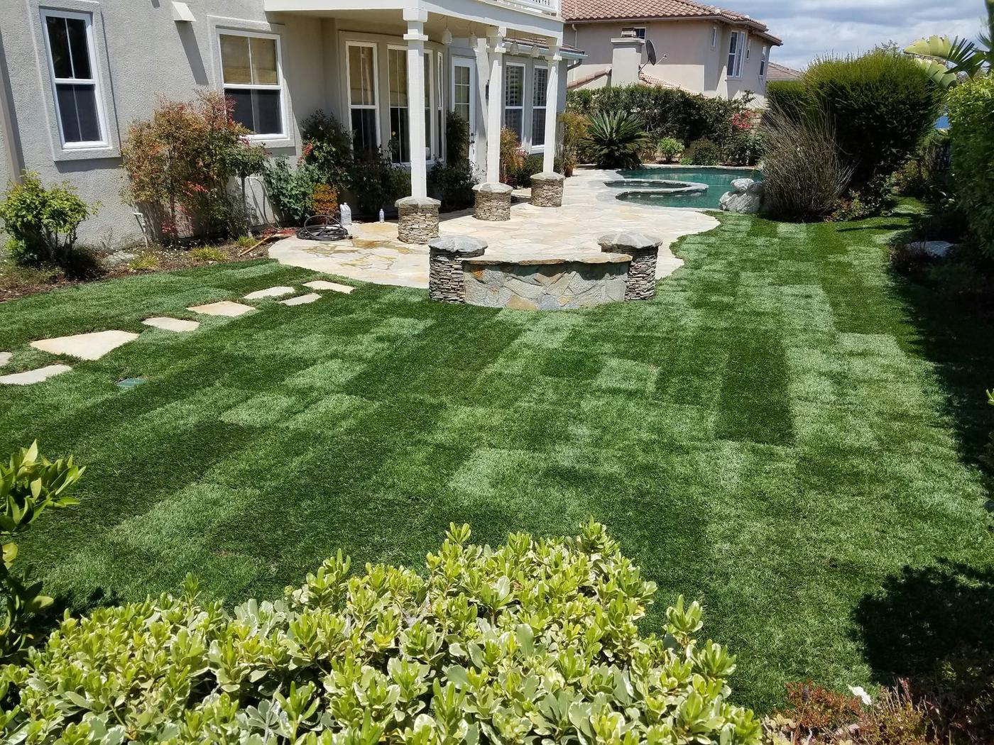 Completed backyard with lawn and path
